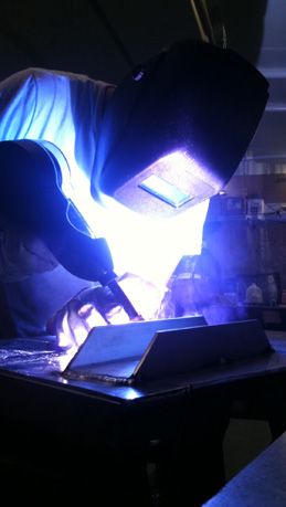 Mike Gorton fixing a broken aluminum platform.