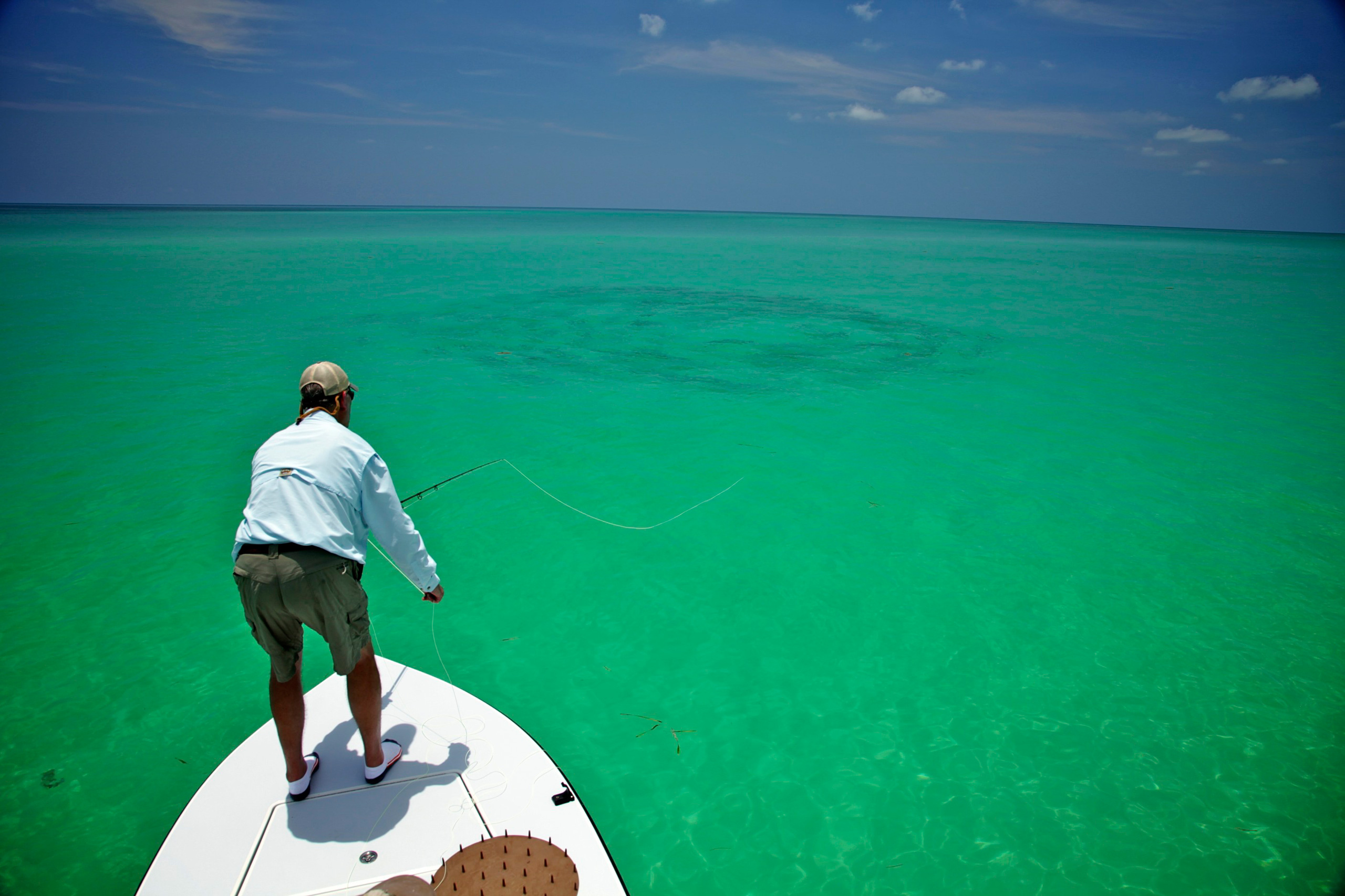 Jon Davis casts into a big daisy chain on the oceanside off Key West. Fly Fisherman's dream opportunity!